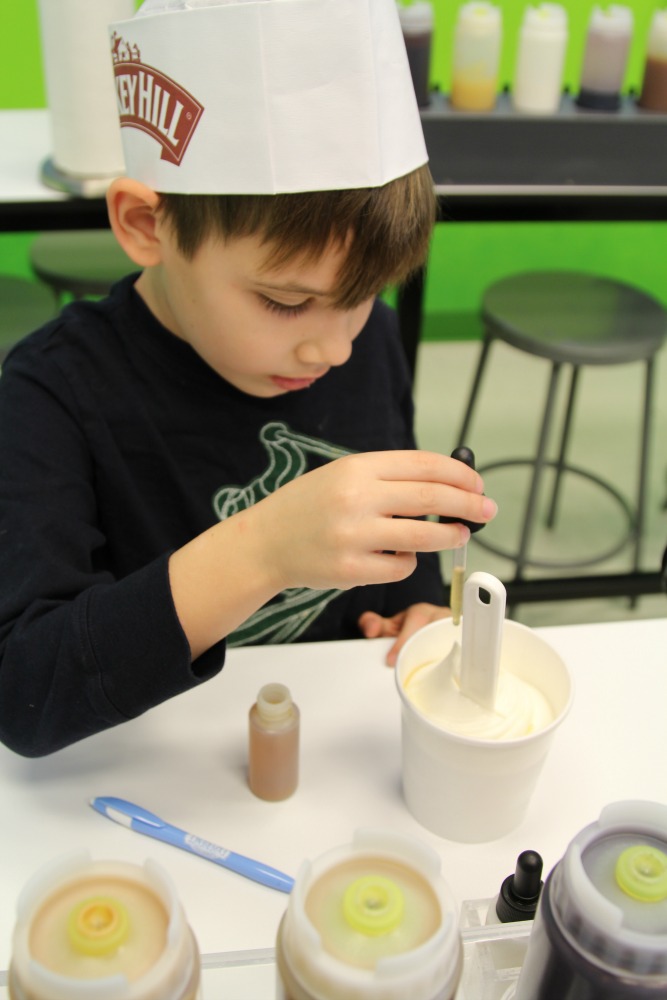 Making your own flavor of ice cream is serious business at the Turkey Hill Experience Taste Lab